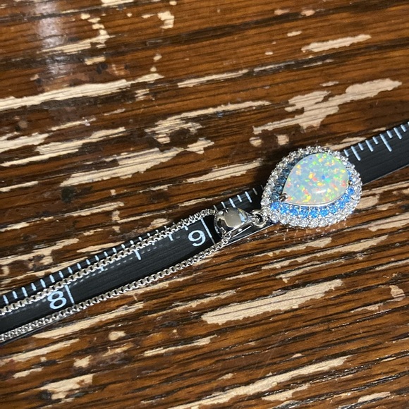Beautiful fire Opal with light blue and clear stones stamped 925 - Picture 9 of 9